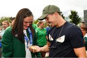 10 August 2021; Gold medallist Kellie Harrington with WBA Interim World Featherweight title holder Michael Conlan at Dublin Airport as Team Ireland's boxers return from the Tokyo 2020 Olympic Games. Photo by Seb Daly/Sportsfile