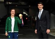 10 August 2021; Gold medallist Kellie Harrington and Minister of State for Sport, the Gaeltacht & Defence, Jack Chambers TD, at Dublin Airport as Team Ireland's boxers return from the Tokyo 2020 Olympic Games. Photo by Seb Daly/Sportsfile