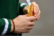 10 August 2021; Gold medallist Kellie Harrington holds her medal as she is interviewed at Dublin Airport as Team Ireland's boxers return from the Tokyo 2020 Olympic Games. Photo by Seb Daly/Sportsfile