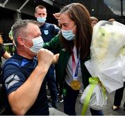 10 August 2021; Gold medallist Kellie Harrington with Mel Leonard of St Mary's Boxing Club, Tallaght, at Dublin Airport as Team Ireland's boxers return from the Tokyo 2020 Olympic Games. Photo by Seb Daly/Sportsfile