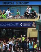 10 August 2021; An emotional Team Ireland women's lightweight gold medallist Kellie Harrington and Emmet Brennan as the bus turns the corner onto Portland Row in Dublin on their return from the Tokyo 2020 Summer Olympic Games. Photo by David Fitzgerald/Sportsfile