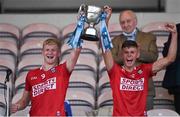11 August 2021; Cork joint captains Rory O'Shaughnessy, left, and Hugh O'Connor lift the cup after the Electric Ireland Munster minor football championship final match between Cork and Limerick at Semple Stadium in Thurles, Tipperary.  Photo by Piaras Ó Mídheach/Sportsfile