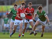11 August 2021; Shane O'Connell of Cork in action against Darragh Clifford, left, and Stephen Kiely of Limerick during the Electric Ireland Munster minor football championship final match between Cork and Limerick at Semple Stadium in Thurles, Tipperary.  Photo by Piaras Ó Mídheach/Sportsfile