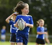 12 August 2021; Lily Richardson, age 7, in action during the Bank of Ireland Leinster Rugby Summer Camp at Newbridge RFC in Newbridge, Kildare. Photo by Matt Browne/Sportsfile