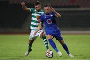 12 August 2021; Albano Aleksi of Teuta in action against Danny Mandroiu of Shamrock Rovers during the UEFA Europa Conference League Third Qualifying Round Second Leg match between Teuta and Shamrock Rovers at Elbasan Arena in Elbasan, Albania. Photo by Florion Goga/Sportsfile
