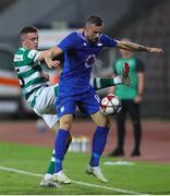 12 August 2021; Albano Aleksi of Teuta in action against Gary O'Neill of Shamrock Rovers during the UEFA Europa Conference League Third Qualifying Round Second Leg match between Teuta and Shamrock Rovers at Elbasan Arena in Elbasan, Albania. Photo by Florion Goga/Sportsfile