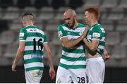 12 August 2021; Rory Gaffney of Shamrock Rovers, right, celebrates with team-mates Joey O'Brien, centre, and Gary O'Neill after scoring his side's second goal during the UEFA Europa Conference League Third Qualifying Round Second Leg match between Teuta and Shamrock Rovers at Elbasan Arena in Elbasan, Albania. Photo by Florion Goga/Sportsfile