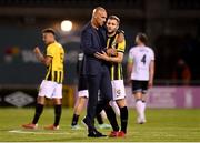 12 August 2021; Vitesse manager Thomas Letsch and Sondre Tronstad of Vitesse embrace after their side's victory of the UEFA Europa Conference League third qualifying round second leg match between Dundalk and Vitesse at Tallaght Stadium in Dublin. Photo by Ben McShane/Sportsfile