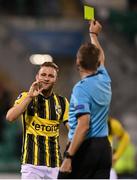 12 August 2021; Sondre Tronstad of Vitesse is shown a yellow card by referee Alain Durieux during the UEFA Europa Conference League third qualifying round second leg match between Dundalk and Vitesse at Tallaght Stadium in Dublin. Photo by Seb Daly/Sportsfile