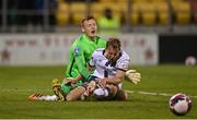 12 August 2021; David McMillan of Dundalk collides with Vitesse goalkeeper Markus Schubert during the UEFA Europa Conference League third qualifying round second leg match between Dundalk and Vitesse at Tallaght Stadium in Dublin. Photo by Seb Daly/Sportsfile