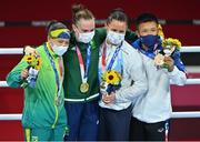 8 August 2021; Silver medallist Beatriz Ferreira of Brazil, left, gold medallist Kellie Harrington of Ireland, centre, and bronze medallists Mira Marjut Johanna Potkonen of Finland and Sudaporn Seesondee of Thailand with their medals after the women's lightweight bouts at the Kokugikan Arena during the 2020 Tokyo Summer Olympic Games in Tokyo, Japan. Photo by Brendan Moran/Sportsfile