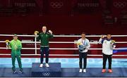 8 August 2021; Silver medallist Beatriz Ferreira of Brazil, left, gold medallist Kellie Harrington of Ireland, centre, and bronze medallists Mira Marjut Johanna Potkonen of Finland and Sudaporn Seesondee of Thailand with their medals after the women's lightweight bouts at the Kokugikan Arena during the 2020 Tokyo Summer Olympic Games in Tokyo, Japan. Photo by Brendan Moran/Sportsfile