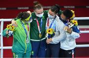 8 August 2021; Silver medallist Beatriz Ferreira of Brazil, left, gold medallist Kellie Harrington of Ireland, centre, and bronze medallists Mira Marjut Johanna Potkonen of Finland and Sudaporn Seesondee of Thailand with their medals after the women's lightweight bouts at the Kokugikan Arena during the 2020 Tokyo Summer Olympic Games in Tokyo, Japan. Photo by Brendan Moran/Sportsfile