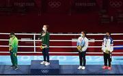 8 August 2021; Silver medallist Beatriz Ferreira of Brazil, left, gold medallist Kellie Harrington of Ireland, centre, and bronze medallists Mira Marjut Johanna Potkonen of Finland and Sudaporn Seesondee of Thailand with their medals on the podium after the women's lightweight bouts at the Kokugikan Arena during the 2020 Tokyo Summer Olympic Games in Tokyo, Japan. Photo by Brendan Moran/Sportsfile