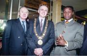 6 February 1995; WBO super middleweight champion Chris Eubank with promoter Barney Eastwood, left, and Lord Mayor of Dublin, Councillor John Gormley, as he arrives for a press conference at the Jury's Hotel in Ballsbridge, Dublin, ahead of his WBO super middleweight title fight against Steve Collins in Cork in March. Photo by David Maher/Sportsfile