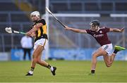 13 August 2021; Joe Fitzpatrick of Kilkenny scores a point under pressure from Darragh Neary of Galway during the Electric Ireland GAA All-Ireland hurling minor championship semi-final match between Kilkenny and Galway at Semple Stadium in Thurles, Tipperary. Photo by Piaras Ó Mídheach/Sportsfile