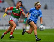 14 August 2021; Caoimhe O'Connor of Dublin in action against Saoirse Lally of Mayo during the TG4 Ladies Football All-Ireland Championship semi-final match between Dublin and Mayo at Croke Park in Dublin. Photo by Ray McManus/Sportsfile