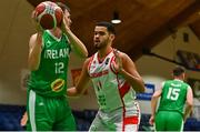 14 August 2021; Will Hanley of Ireland in action against Mohamed El Yettefti of Gibraltar during the FIBA Men’s European Championship for Small Countries day four match between Gibraltar and Ireland at National Basketball Arena in Tallaght, Dublin. Photo by Eóin Noonan/Sportsfile