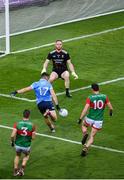 14 August 2021; Colm Basquel of Dublin shoots wide under pressure from Mayo goalkeeper Rob Hennelly during the GAA Football All-Ireland Senior Championship semi-final match between Dublin and Mayo at Croke Park in Dublin. Photo by Stephen McCarthy/Sportsfile