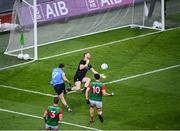 14 August 2021; Colm Basquel of Dublin shoots wide under pressure from Mayo goalkeeper Rob Hennelly during the GAA Football All-Ireland Senior Championship semi-final match between Dublin and Mayo at Croke Park in Dublin. Photo by Stephen McCarthy/Sportsfile