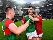 14 August 2021; Mayo players, from left, Ryan O'Donoghue, Diarmuid O'Connor and Colm Boyle celebrate after their side's victory in the GAA Football All-Ireland Senior Championship semi-final match between Dublin and Mayo at Croke Park in Dublin. Photo by Piaras Ó Mídheach/Sportsfile