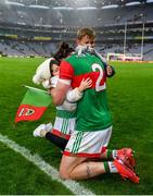 14 August 2021; Pádraig O'Hora of Mayo celebrates with his children Caiden and Mila-Rae after his side's victory over Dublin in their GAA Football All-Ireland Senior Championship semi-final match at Croke Park in Dublin. Photo by Seb Daly/Sportsfile