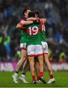 14 August 2021; Enda Hession, 19, Brendan Harrison, and Patrick Durcan of Mayo celebrate after the GAA Football All-Ireland Senior Championship semi-final match between Dublin and Mayo at Croke Park in Dublin. Photo by Ray McManus/Sportsfile