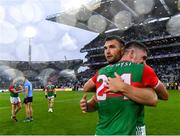 14 August 2021; Mayo players Aidan O'Shea, behind, and Jordan Flynn celebrate after their side's victory in the GAA Football All-Ireland Senior Championship semi-final match between Dublin and Mayo at Croke Park in Dublin. Photo by Piaras Ó Mídheach/Sportsfile