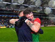 14 August 2021; Jordan Flynn of Mayo, right, celebrates with Mayo coach Ciarán McDonald after their side's victory in the GAA Football All-Ireland Senior Championship semi-final match between Dublin and Mayo at Croke Park in Dublin. Photo by Piaras Ó Mídheach/Sportsfile