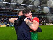 14 August 2021; Jordan Flynn of Mayo, right, celebrates with Mayo coach Ciarán McDonald after their side's victory in the GAA Football All-Ireland Senior Championship semi-final match between Dublin and Mayo at Croke Park in Dublin. Photo by Piaras Ó Mídheach/Sportsfile