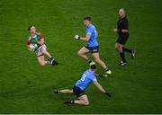 14 August 2021; Ryan O'Donoghue of Mayo in action against David Byrne, 3, and Seán Bugler of Dublin during the GAA Football All-Ireland Senior Championship semi-final match between Dublin and Mayo at Croke Park in Dublin. Photo by Stephen McCarthy/Sportsfile