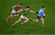 14 August 2021; Colm Basquel of Dublin in action against Pádraig O'Hora, left, and Conor Loftus of Mayo during the GAA Football All-Ireland Senior Championship semi-final match between Dublin and Mayo at Croke Park in Dublin. Photo by Stephen McCarthy/Sportsfile