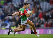 14 August 2021; Tommy Conroy of Mayo in action against David Byrne of Dublin during the GAA Football All-Ireland Senior Championship semi-final match between Dublin and Mayo at Croke Park in Dublin. Photo by Seb Daly/Sportsfile