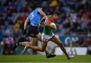 14 August 2021; Tommy Conroy of Mayo in action against David Byrne of Dublin during the GAA Football All-Ireland Senior Championship semi-final match between Dublin and Mayo at Croke Park in Dublin. Photo by Seb Daly/Sportsfile