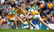 15 August 2021; Tomas Crean of Roscommon in action against Aaron Kellaghan, left, and Jack Bryant of Offaly during the 2021 Eirgrid GAA Football All-Ireland U20 Championship Final match between Roscommon and Offaly at Croke Park in Dublin. Photo by Stephen McCarthy/Sportsfile