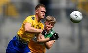 15 August 2021; Colin Walsh of Roscommon in action against Jack Bryant of Offaly during the 2021 Eirgrid GAA Football All-Ireland U20 Championship Final match between Roscommon and Offaly at Croke Park in Dublin. Photo by Stephen McCarthy/Sportsfile
