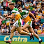15 August 2021; Jack Bryant of Offaly, left, celebrates with team-mate Morgan Tynan after he scored a goal, in the 50th minute, during the 2021 Eirgrid GAA Football All-Ireland U20 Championship Final match between Roscommon and Offaly at Croke Park in Dublin. Photo by Ray McManus/Sportsfile