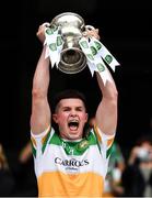 15 August 2021; Offaly team captain Kieran Dolan lifts the cup after the 2021 Eirgrid GAA Football All-Ireland U20 Championship Final match between Roscommon and Offaly at Croke Park in Dublin. Photo by Ray McManus/Sportsfile