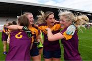 15 August 2021; Wexford players, from left, Shauna Murphy, Sadbh McCarthy, Aisling Halligan and Amy Wilson celebrate after their side's victory in the TG4 All-Ireland Intermediate Ladies Football Championship Semi-Final match between Laois and Wexford at UPMC Nowlan Park in Kilkenny. Photo by Piaras Ó Mídheach/Sportsfile