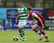 15 August 2021; Graham Burke of Shamrock Rovers in action against Jake Hyland of Drogheda United during the SSE Airtricity League Premier Division match between Drogheda United and Shamrock Rovers at Head in the Game Park in Drogheda, Louth. Photo by Michael P Ryan/Sportsfile