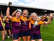 15 August 2021; Wexford players, from left, Sadbh McCarthy, Aisling Halligan, and Amy Wilson, celebrate after their side's victory in the TG4 All-Ireland Intermediate Ladies Football Championship Semi-Final match between Laois and Wexford at UPMC Nowlan Park in Kilkenny. Photo by Piaras Ó Mídheach/Sportsfile