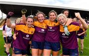15 August 2021; Wexford players, from left, Ciara Banville, Sadbh McCarthy, Aisling Halligan, and Amy Wilson, celebrate after their side's victory in the TG4 All-Ireland Intermediate Ladies Football Championship Semi-Final match between Laois and Wexford at UPMC Nowlan Park in Kilkenny. Photo by Piaras Ó Mídheach/Sportsfile