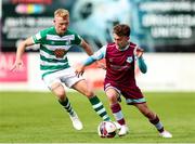 15 August 2021; Darragh Markey of Drogheda United in action against Liam Scales of Shamrock Rovers during the SSE Airtricity League Premier Division match between Drogheda United and Shamrock Rovers at Head in the Game Park in Drogheda, Louth. Photo by Michael P Ryan/Sportsfile