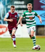 15 August 2021; Liam Scales of Shamrock Rovers in action against Mark Doyle of Drogheda United during the SSE Airtricity League Premier Division match between Drogheda United and Shamrock Rovers at Head in the Game Park in Drogheda, Louth. Photo by Michael P Ryan/Sportsfile