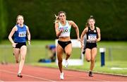 15 August 2021; Charlotte Wingfield of Raheny Shamrocks, centre, on her way to finishing second in the Women's 100m during the Irish Life Health National League Final at Tullamore Harriers Stadium in Tullamore, Offaly. Photo by Sam Barnes/Sportsfile