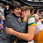 15 August 2021; Jack Bryant of Offaly is congratulated by Anne Moran who is a member of his Shamrocks GAA Club after the 2021 Eirgrid GAA Football All-Ireland U20 Championship Final match between Roscommon and Offaly at Croke Park in Dublin. Photo by Ray McManus/Sportsfile