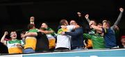 15 August 2021; Offaly supporters, in the Hogan Stand, includin Open winner Shane Lowry, wearing the 15 shirt, celebrate after the 2021 Eirgrid GAA Football All-Ireland U20 Championship Final match between Roscommon and Offaly at Croke Park in Dublin. Photo by Ray McManus/Sportsfile