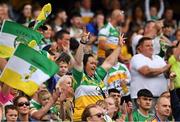 15 August 2021; Offaly supporters, in the Cusack Stand, celebrate a score during the 2021 Eirgrid GAA Football All-Ireland U20 Championship Final match between Roscommon and Offaly at Croke Park in Dublin. Photo by Ray McManus/Sportsfile