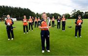 15 August 2021; Scorchers captain Leah Paul with the trophy, and her team-mates, following the Arachas Super Series 2021 Super 20 round 6 match between Typhoons and Scorchers at North Kildare Cricket Club in Kilcock, Kildare. Photo by Ramsey Cardy/Sportsfile