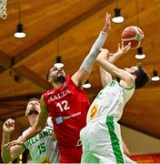 15 August 2021; Eoin Quigley of Ireland in action against Aaron Falzon of Malta during the FIBA Men’s European Championship for Small Countries day five match between Ireland and Malta at National Basketball Arena in Tallaght, Dublin. Photo by Eóin Noonan/Sportsfile